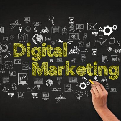Digital Marketing concept with hand drawing online marketing icons on blackboard background"